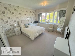 Bedroom One- click for photo gallery